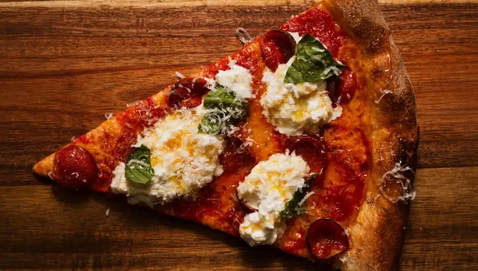 A single slice of pizza.