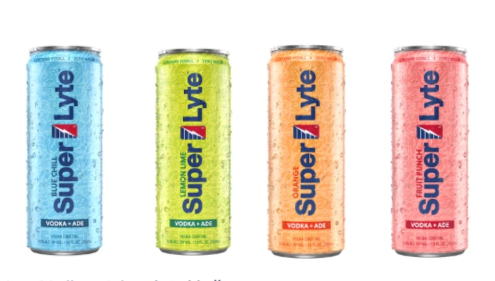 Four different flavors and cans of Super Lyte: Blue Chill, Leon-Lime, Orange, and Fruit Punch.