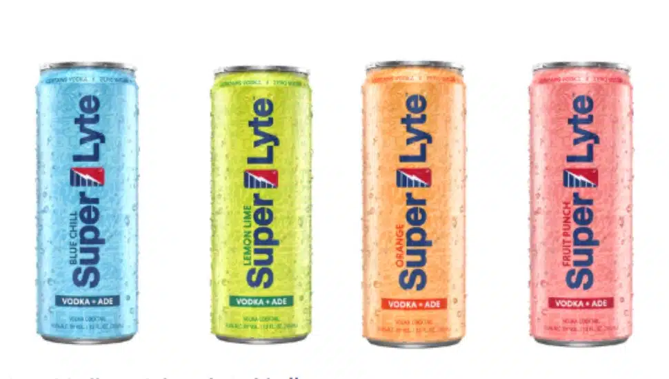 Four different flavors and cans of Super Lyte: Blue Chill, Leon-Lime, Orange, and Fruit Punch.
