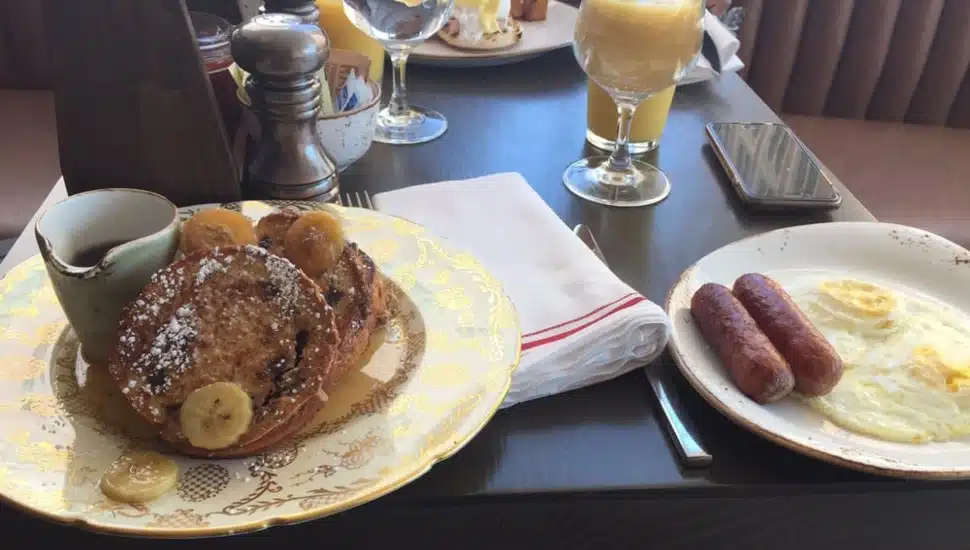 Cinnamon French toast and side of eggs and sausage..