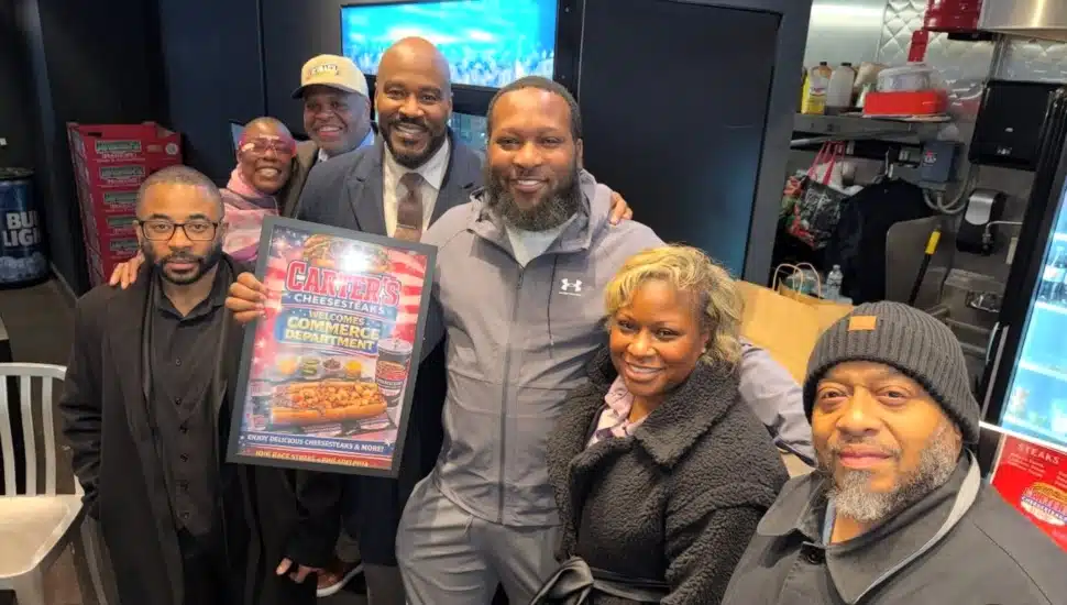 Levell "Garci" Peterkin with members of the Philadelphia Commerce Department.