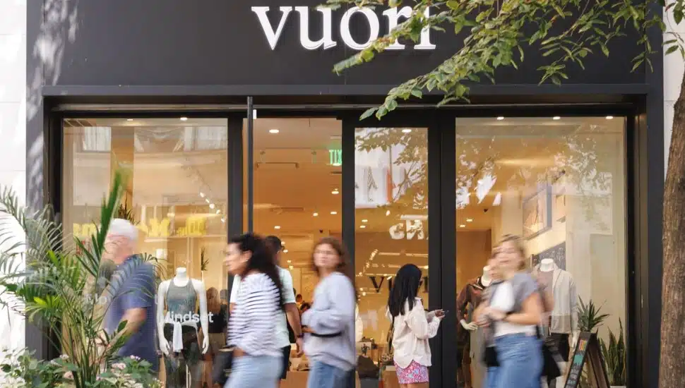 People walking by Vuori store in Center City Philadelphia.
