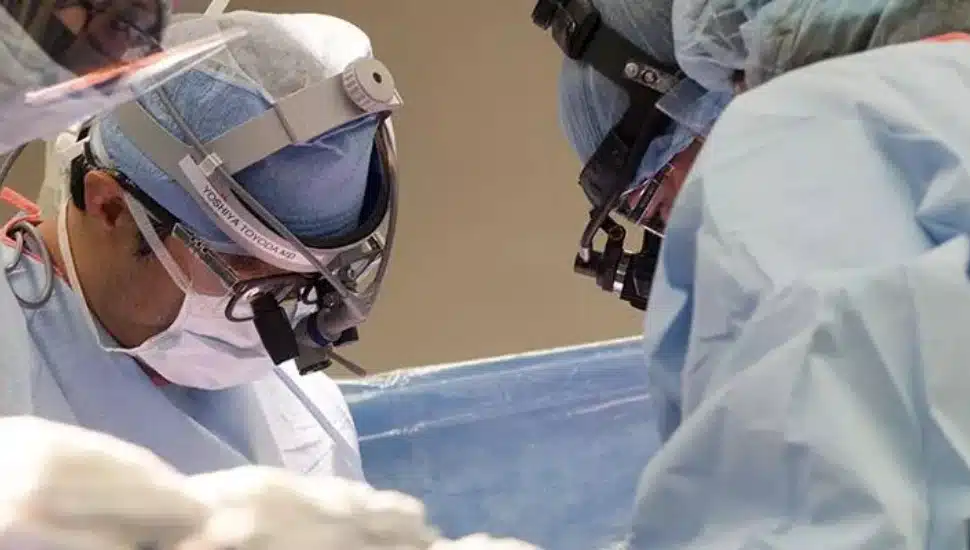 Doctors performing a heart transplant.