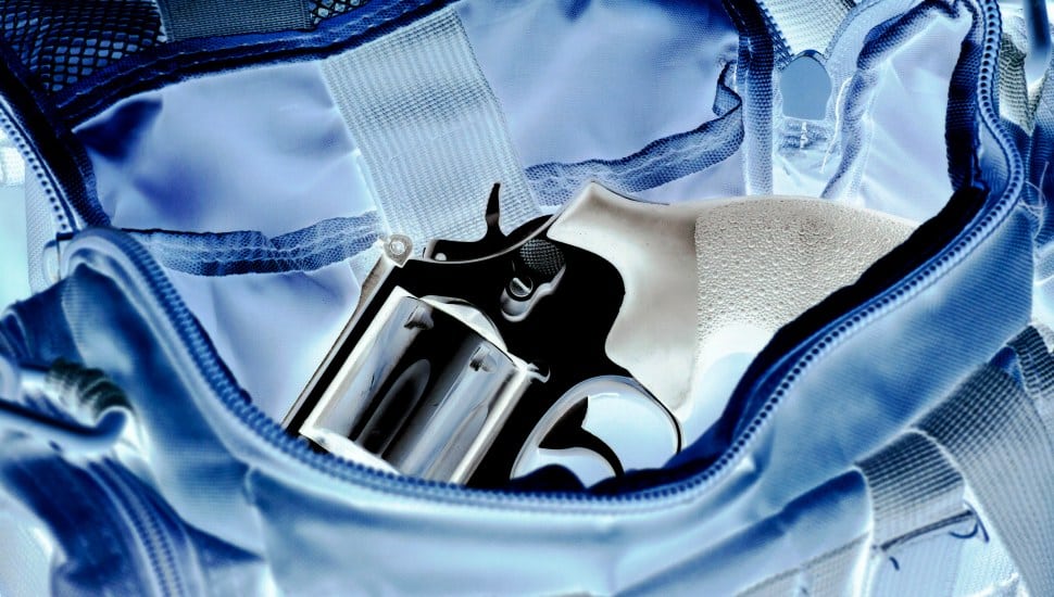 Xray scan detects weapon in criminals briefcase