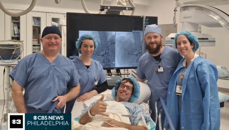 Craig Heffentrager surrounded by doctors.