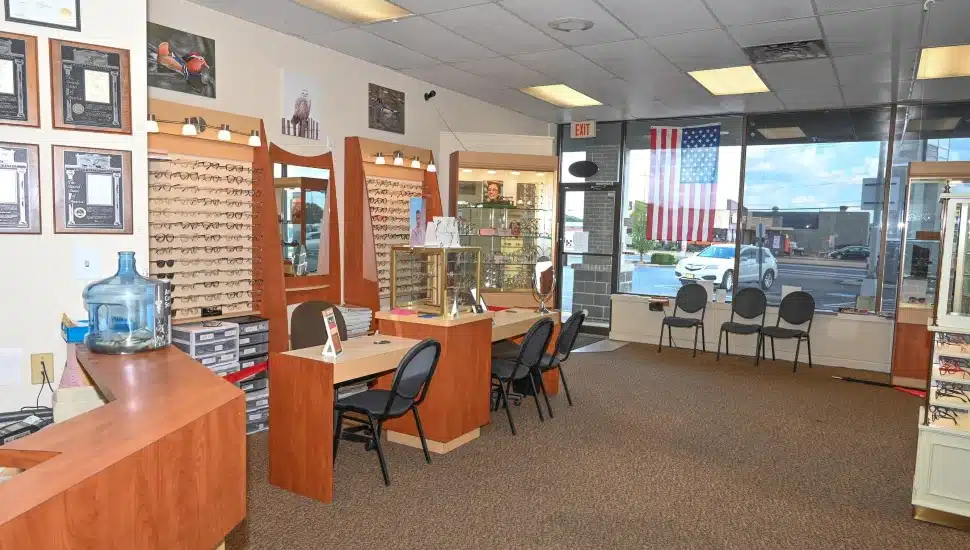 Inside Philadelphia Vision Center with glasses hanging on the walls.