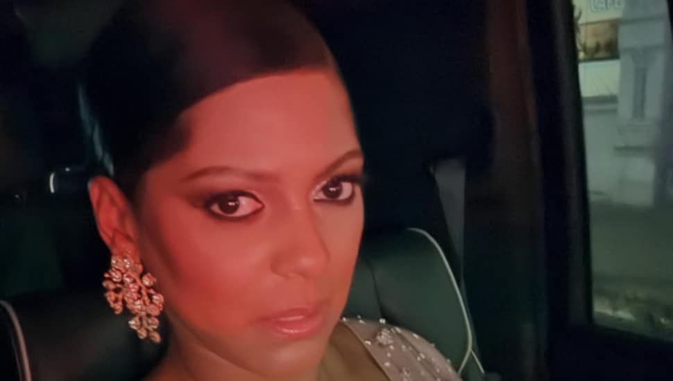 Tamron Hall sitting in a car.