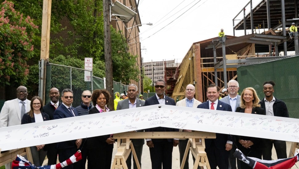 Rutgers-Camden faculty celebrating Cooper Street Gateway Project advancement.
