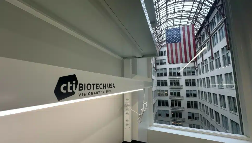 CTIBIOTECH USA office at BioLabs Philadelphia with American flag visible through atrium window.