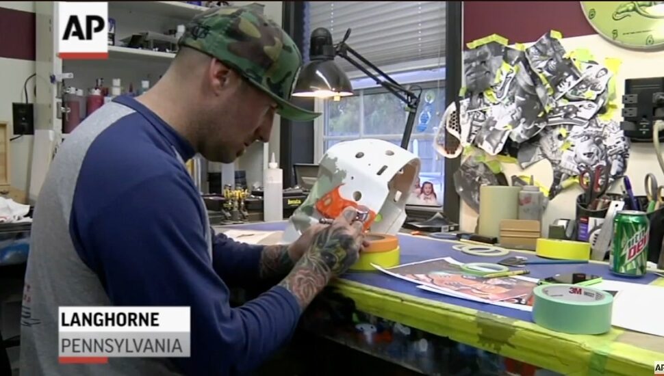 Franny Drummond works on a goalie mask in his Langhorne studio.