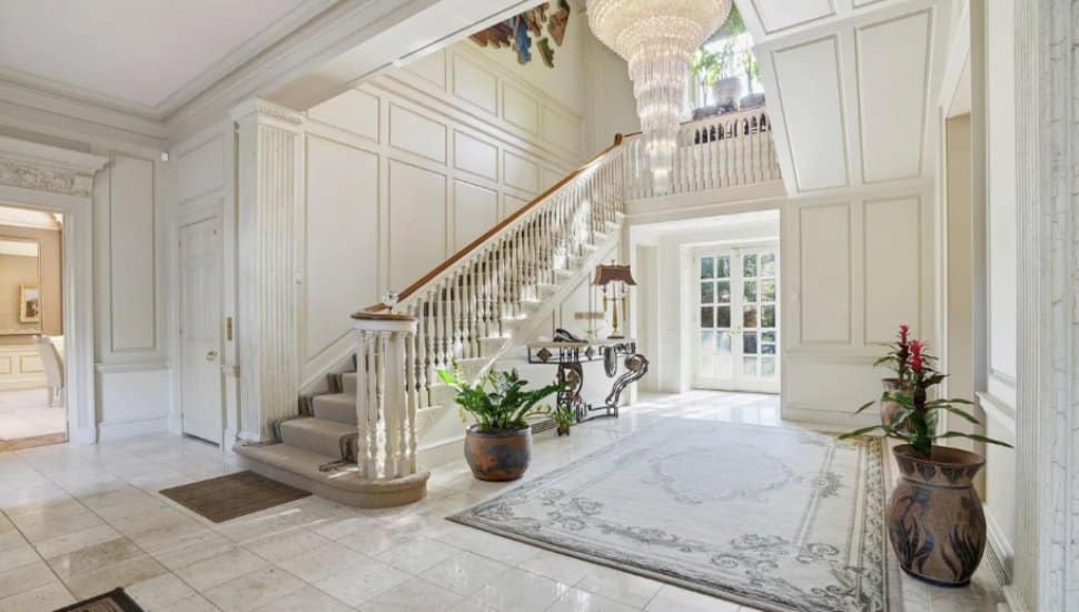 The white foyer inside the former Harold Katz mansion in Huntingdon Valley.