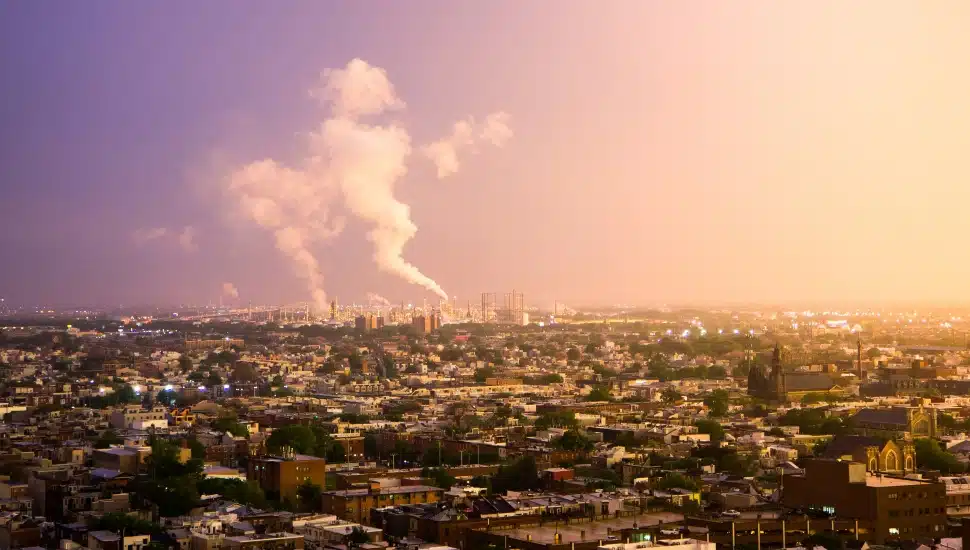 Oil refineries in South Philly give off smoke after a strong summer storm.