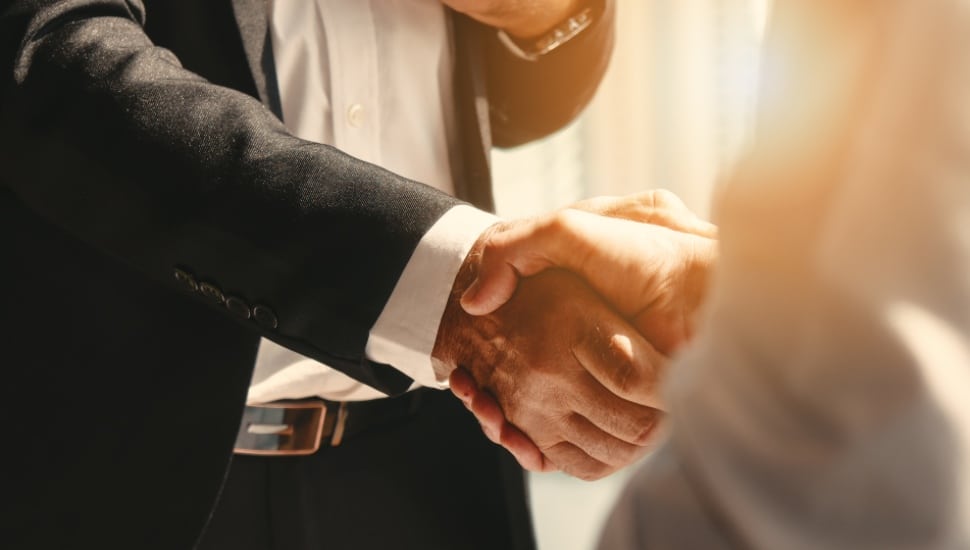 Businessman handshake after an agreement.