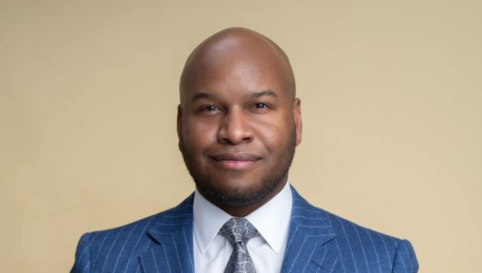 Michael Newmuis, Philadelphia's 2026 director, in a formal portrait.
