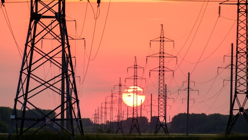 Sunset amidst power lines.
