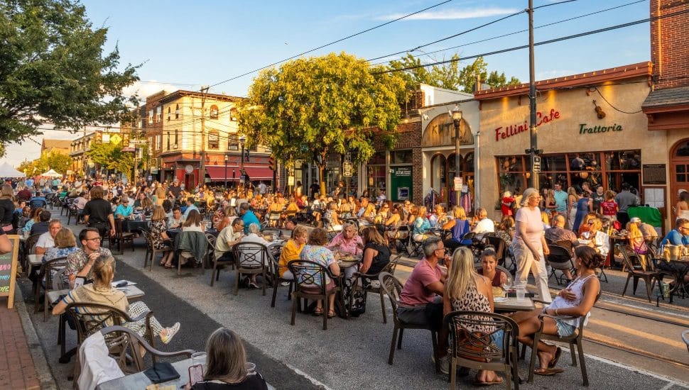 People sitting outside during Dining Under the Stars in Media.