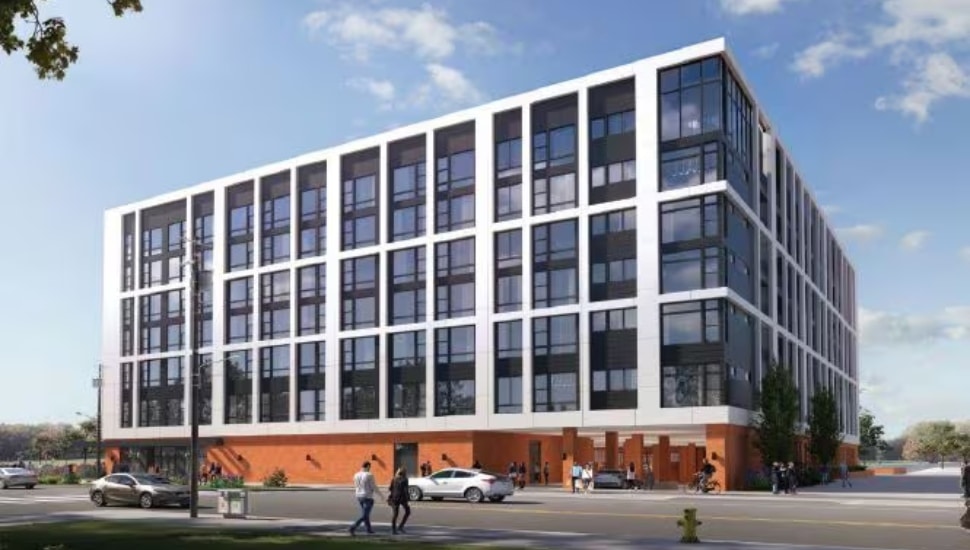 Architectural rendering of the Residences at Pier 40, a seven-story apartment building in Philadelphia's Northern Liberties neighborhood, featuring a modern glass-and-steel facade with a brick base along a street-level sidewalk.